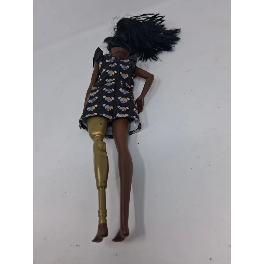 mattel 2014 african american doll with prosthetic leg. U